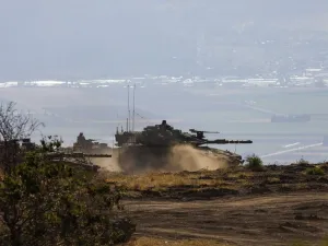 An Israeli army Merkava Mark IV tank takes part in a military drill in the Israeli-annexed Golan Heights on June 24, 2020. JALAA MAREY / AFP