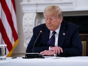 U.S. President Donald Trump pauses while making remarks as he participates in a roundtable with law enforcement officials in the State Dining Room of the White House, June, 8, 2020 in Washington, DC. From L-R is Attorney General William Barr, Daniel J, Cameron Attorney General for the Commonwealth of Kentucky, Trump. Doug Mills-Pool/Getty Images/AFP POOL / GETTY IMAGES NORTH AMERICA / Getty Images via AFP
