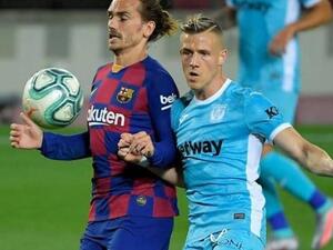 أنتوان غريزمان (يسار)