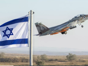 An Israeli Air Force F-15 Eagle fighter plane performs at an air show during the graduation of new cadet pilots at Hatzerim base in the Negev desert, on June 29, 2017. (Jack Guez, AFP)