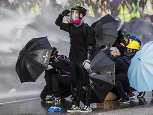 More than 6,000 people have been arrested, and nearly 3,000 people injured since protests began in June [Isaac Lawrence/AFP] 