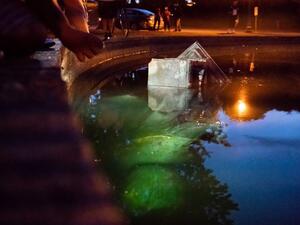 A statue of Christopher Columbus in Byrd Park has been removed by protesters and dragged into the lake (Twitter)