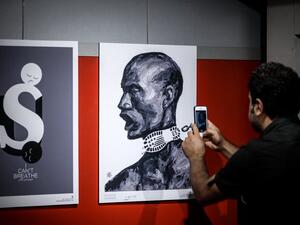 The international cartoon exhibition “I Can’t Breathe”,highlighting protests against racism in the U.S.,opened in the Aali Gallery of the Art Bureau in Tehran. (Twitter)