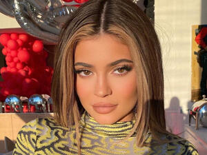 Kylie Jenner Stuns in Platinum Blonde Wig and Lacy Slip Dress for Latest Sultry Instagram Snaps