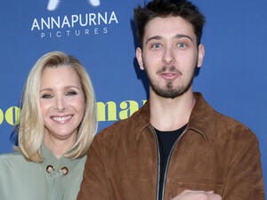 she has 22-year-old Julian with husband Michel Stern