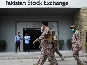 Paramilitary officers inspect the premisses of the Pakistan Stock Exchange building following an attack by gunmen in Karachi on June 29, 2020. Rizwan TABASSUM / AFP