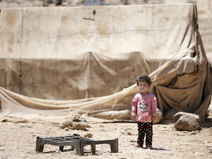 A syrian refugee child in front of his tent in Zaatari refugee camp. (Shutterstock/ File Photo)