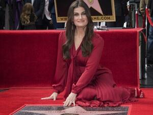 Actress Idina Menzel is honored with a star on the Hollywood Walk of Fame, in Hollywood, California on November 19, 2019. (Mark RALSTON / AFP)