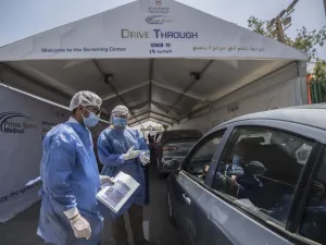 Egyptian health workers collect samples at a drive-through coronavirus-testing center at the Ain Shams University in Cairo on June 29, 2020. Egypt has so far registered 65,188 COVID-19 cases including 2,789 fatalities. Khaled DESOUKI / AFP
