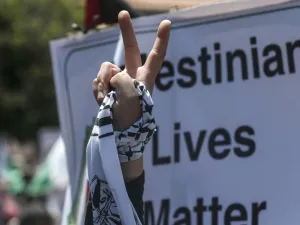 A Palestinian demonstrator flashes the victory sign during a rally as Palestinians call for a "Day of Rage" to protest Israel's plan to annex parts of the occupied West Bank, in Gaza City on July 1, 2020. Expectations of a major Israeli announcement on controversial annexations in the occupied West Bank dimmed, as global criticism of the project mounted and Palestinian protesters began gathering in Gaza. MAHMUD HAMS / AFP
