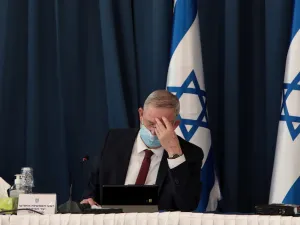 Israeli defence minister and alternate prime minister Benny Gantz wears a protective mask as he attends the weekly cabinet meeting at the foreign ministry in Jerusalem on July 5, 2020. GALI TIBBON / POOL / AFP