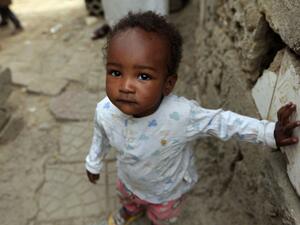 A child of Yemen's minority group known as "Muhamasheen" -- literally the "Marginalised" is pictured at a slum in the capital Sanaa on July 4, 2020. At a time when the Black Lives Matter movement is reshaping societies, black Yemenis have scant hope for an end to centuries of discrimination that has only worsened during the civil war. In Sanaa, members of the minority group known as "Muhamasheen" live in dismal conditions in densely populated slums. They count among the poorest of the poor in the Arab world