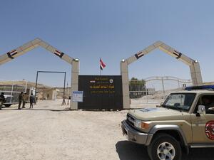 Members of the Hashed al-Shaabi (Popular Mobilisation) paramilitary forces stand guard on the Iraqi side of the Mandili crossing on the border with Iran on July 11, 2020. Iraqi Prime Minister Mustafa al-Kadhemi launched a new campaign against corruption at the country's borders, saying millions of dollars were being lost by not properly taxing imported goods. Thaier Al-SUDANI / POOL / AFP