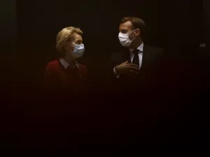 President of the European Commission Ursula von der Leyen (L) talks with France's President Emmanuel Macron prior the start of the EU summit at the European Council building in Brussels, on July 18, 2020, as the leaders of the European Union hold their first face-to-face summit over a post-virus economic rescue plan. The EU has been plunged into a historic economic crunch by the coronavirus crisis, and EU officials have drawn up plans for a huge stimulus package to lead their countries out of lockdown.  Fra