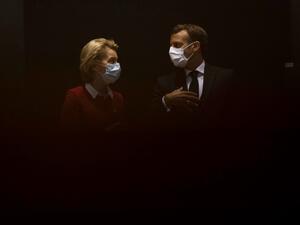 President of the European Commission Ursula von der Leyen (L) talks with France's President Emmanuel Macron prior the start of the EU summit at the European Council building in Brussels, on July 18, 2020, as the leaders of the European Union hold their first face-to-face summit over a post-virus economic rescue plan. The EU has been plunged into a historic economic crunch by the coronavirus crisis, and EU officials have drawn up plans for a huge stimulus package to lead their countries out of lockdown.  Fra