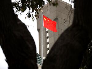 The Chinese flag flies over the Consulate General of China on July 24, 2020 in San Francisco, California. Juan Tang, a researcher at the University of California, Davis who took refuge in the Chinese consulate in San Francisco, was arrested for allegedly lying to investigators about her Chinese military service. Justin Sullivan/Getty Images/AFP