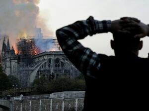 Macron wants Notre-Dame restored to its former glory by 2024, in time for the Paris Olympics. (AFP/File Photo)