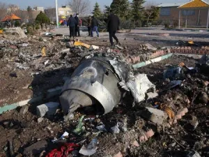 Rescue teams work amidst debris after a Ukrainian plane crashed near Imam Khomeini airport in Tehran. (File photo/ AFP)