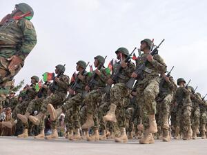 Afghan National Army soldiers march during a ceremony in a military base in the Guzara district of Herat province on Feb. 28, 2019. (AFP)