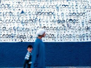 During the International Cultural Moussem of Asilah, Morocco, festival artists paint dozens of murals around town (Twitter)