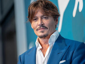 The 57-year-old denies abusing actress Amber Heard — now 34 and the global face of French cosmetics firm L’Oreal