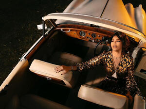 Is Ahlam Accused of Supporting a Money-Laundering Company in Kuwait?
