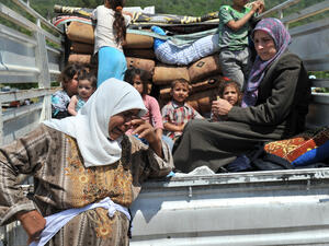 unidentified Syrian refugees, protested at the syria border June 11, 2011 on the Turkish - Syrian border. (Shutterstock/ File Photo)