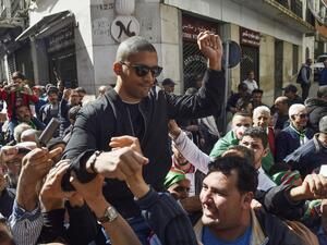  August 3, the trial opened of Algerian journalist Khaled Drareni, who has become a figurehead of press freedom in the North African country, with the prosecution calling for a four-year prison term. RYAD KRAMDI / AFP