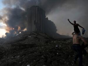 A picture shows the scene of an explosion in Beirut on August 4, 2020. Two huge explosion rocked the Lebanese capital Beirut, wounding dozens of people, shaking buildings and sending huge plumes of smoke billowing into the sky. Lebanese media carried images of people trapped under rubble, some bloodied, after the massive explosions, the cause of which was not immediately known.  STR / AFP