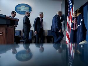 US Secretary of the Treasury Steven Mnuchin, Director of the Office of Management and Budget Russell Vought, member of the coronavirus task force Scott Atlas, and US President Donald Trump leave after a briefing at the White House August 10, 2020, in Washington, DC. Secret Service guards shot a person, who was apparently armed, outside the White House on Monday, President Donald Trump said just after being briefly evacuated in the middle of a press conference. The president was abruptly ushered out of the p