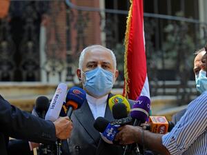 Iran's Foreign Minister Mohammad Javad Zarif, mask-clad due to the COVID-19 coronavirus pandemic, speaks to reporters at Lebanon's foreign ministry headquarters in the capital Beirut on August 14, 2020. ANWAR AMRO / AFP