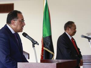 Egyptian Prime Minister Mostafa Madbouli (L) and his Sudanese counterpart Abdalla Hamdok address the press after their meeting in Sudan's capital Khartoum, on August 15, 2020. ASHRAF SHAZLY / AFP