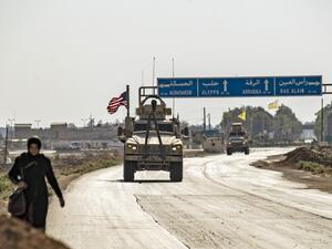 US forces patrol the area of the town of Tal Tamr, in Syria's northeastern Hasakeh province, on August 17, 2020. DELIL SOULEIMAN / AFP