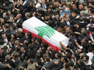 In this file photo taken on February 16, 2005, hundreds of thousands of mourners join the funeral procession of Lebanon's slain former prime minister Rafiq Hariri in central Beirut. Joseph BARRAK / AFP