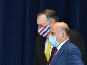 US Secretary of State Michael Pompeo(L) and Iraq's Foreign Minister Fuad Hussein arrive for a press conference at the State Department in Washington, DC on August 19, 2020. MANDEL NGAN / AFP