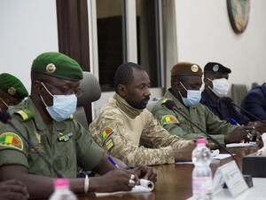 President of the CNSP (National Committee for the Salvation of the People) Assimi Goita (C) prepares for a meeting between Malian military leaders and an ECOWAS delegation headed by former Nigerian president on August 22, 2020, in an aim to restore order after the military coup in Bamako. ANNIE RISEMBERG / AFP