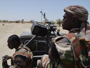 Nigerien soldiers patrol along the Niger border near the south-eastern city of Bosso. (ISSOUF SANOGO/AFP/Getty Images)
