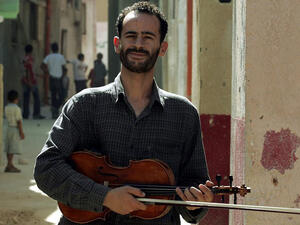 Abu Radwan brought back his knowledge of music from France to Palestine and established AlKamanjati center