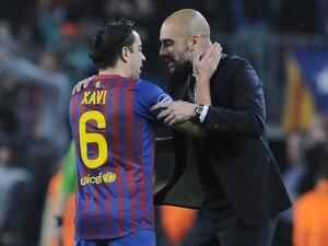 صورة أرشيفية لغوارديولا وتشافي