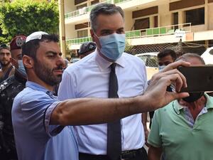 Lebanon's newly-appointed Prime Minister Mustapha Adib (C) visits Beirut's badly-hit Gemmayzeh neighbourhood, on August 31, 2020. Lebanon's under-fire political leaders designated a new prime minister, the diplomat Mustapha Adib, to tackle the country's deep political and economic crisis, hours before French President Emmanuel Macron was due to visit. AFP