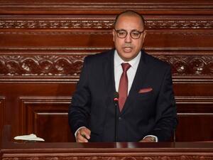 Hichem Mechichi, Prime Minister-designate of Tunisia, delivers a speech to members of parliament as they hold session of confidence in the capital Tunis on September 1, 2020. Fethi Belaid / AFP