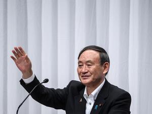 Yoshihide Suga waves following a debate organized by Liberal Democratic Party, Youth Bureau, Women's Bureau at Liberal Democratic Party headquarters in Tokyo on September 9, 2020. Philip FONG / POOL / AFP