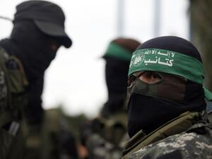 Hamas fighters. (AFP/Mohammed Abed)