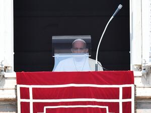 Pope Francis arrives for the weekly Angelus prayer from the window of the apostolic palace overlooking St. Peter's Square on September 13, 2020 in The Vatican, within the COVID-19 infection, caused by the novel coronavirus. Vincenzo PINTO / AFP