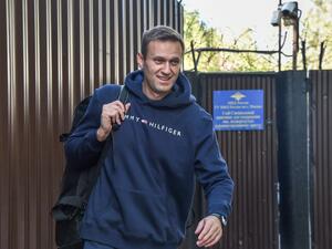 This file photo taken on August 23, 2019 shows Russian opposition leader Alexei Navalny leaving the detention centre in Moscow after serving 30 days in jail. Russian opposition leader Alexei Navalny's condition is improving and he is able to get out of bed for brief periods, the German hospital treating him said Monday, September 14, 2020. "The patient has been successfully removed from mechanical ventilation," Berlin's Charite hospital said in a statement. "He is currently undergoing mobilisation and is ab
