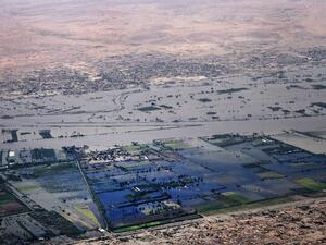 This picture taken on September 14, 2020 aboard an aircraft of the Bahrain Royal Charity Organisation (RCO) shows an aerial view of flooded parts of Sudan's capital Khartoum. Sudanese authorities earlier in September had declared a nationwide three-month state of emergency after record-breaking torrential floods, with the country's top officials urging the international community to step their aid efforts. Mazen Mahdi / AFP