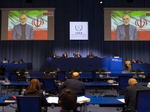 Mohammad Javad Zarif, Iranian foreign minister, is seen speaking on a screen as he attends virtually the 64th General Conference of the International Atomic Energy Agency (IAEA) at its headquarters in Vienna, Austria on September 21, 2020. JOE KLAMAR / AFP