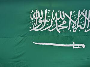 A picture taken on September 23, 2020 shows a Saudi national flag in the capital Riyadh. FAYEZ NURELDINE / AFP