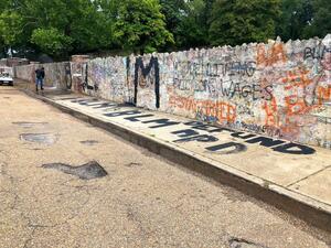 Messages of “Defund the Police” and “BLM” mark the wall outside Graceland on Elvis Presley Boulevard and the Levitt Shell in Overton Park (Twitter)