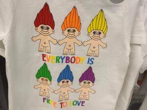 A mother has called for a boycott of Asda and branded the supermarket 'disgusting' for 'promoting paedophilia' by selling children's T-shirts with LGBT flag colours and naked trolls with the slogan 'everybody is free to love' (Twitter)